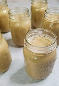 canned dairy free baileys cooling on counter