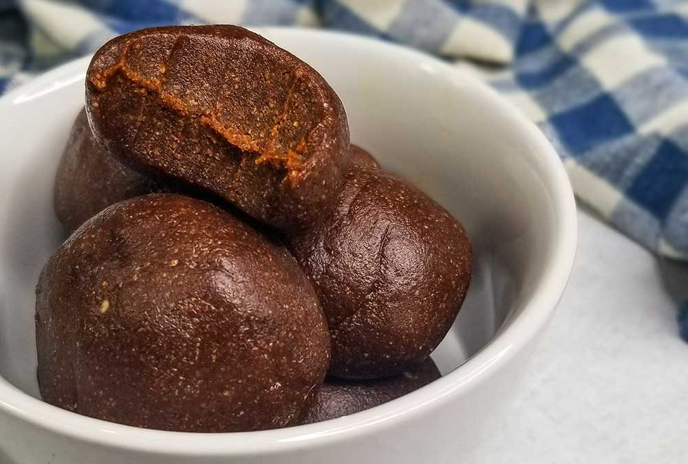 ginger molasses cookie dough bites in a bowl ready to serve