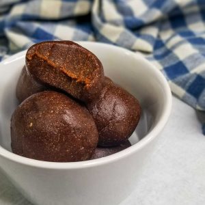 ginger molasses cookie dough bites in a bowl ready to serve