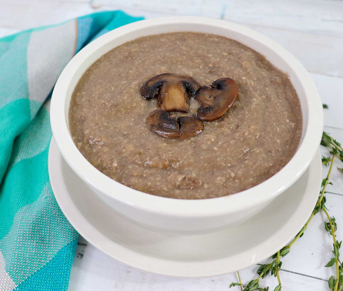 Bowl of cream of mushroom soup ready to serve