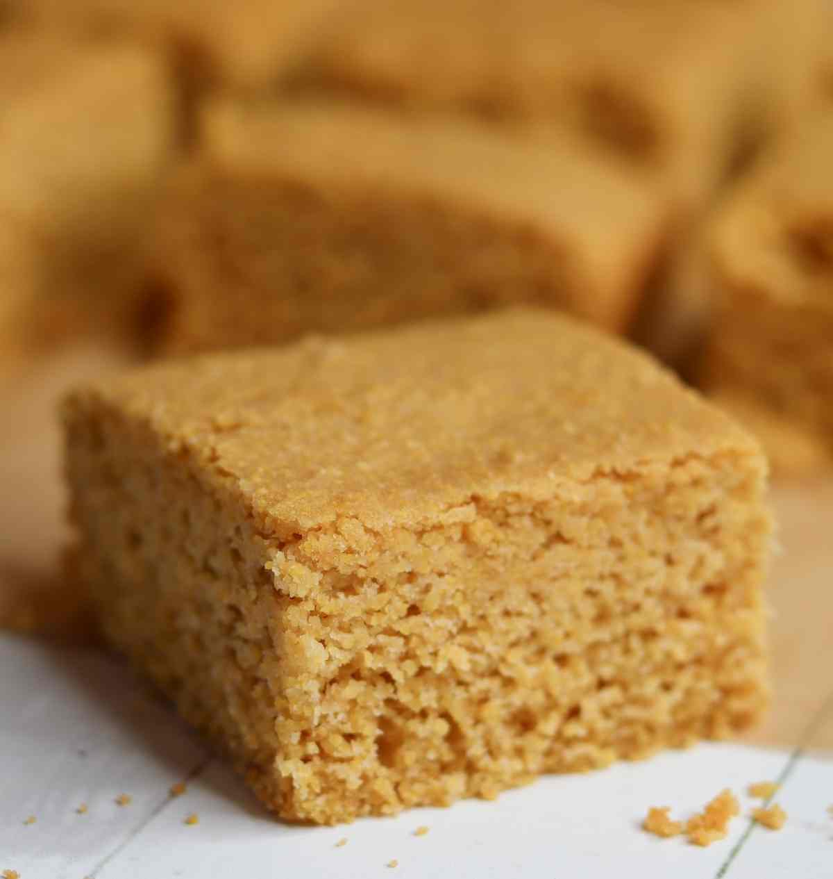 A piece of cornbread on a table