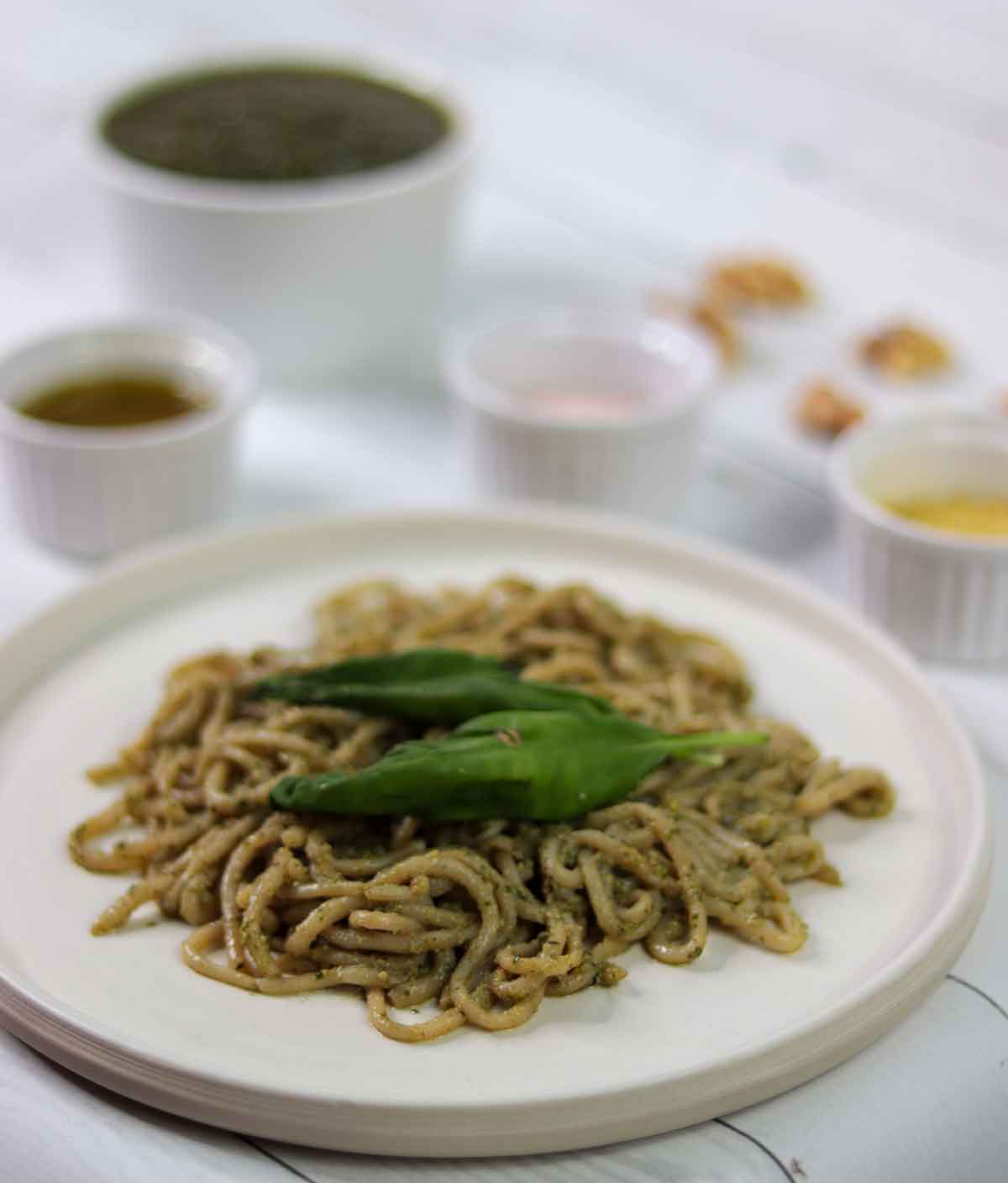 Pasta with basil walnut pesto on it