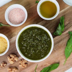 Overhead view of pesto on cutting board