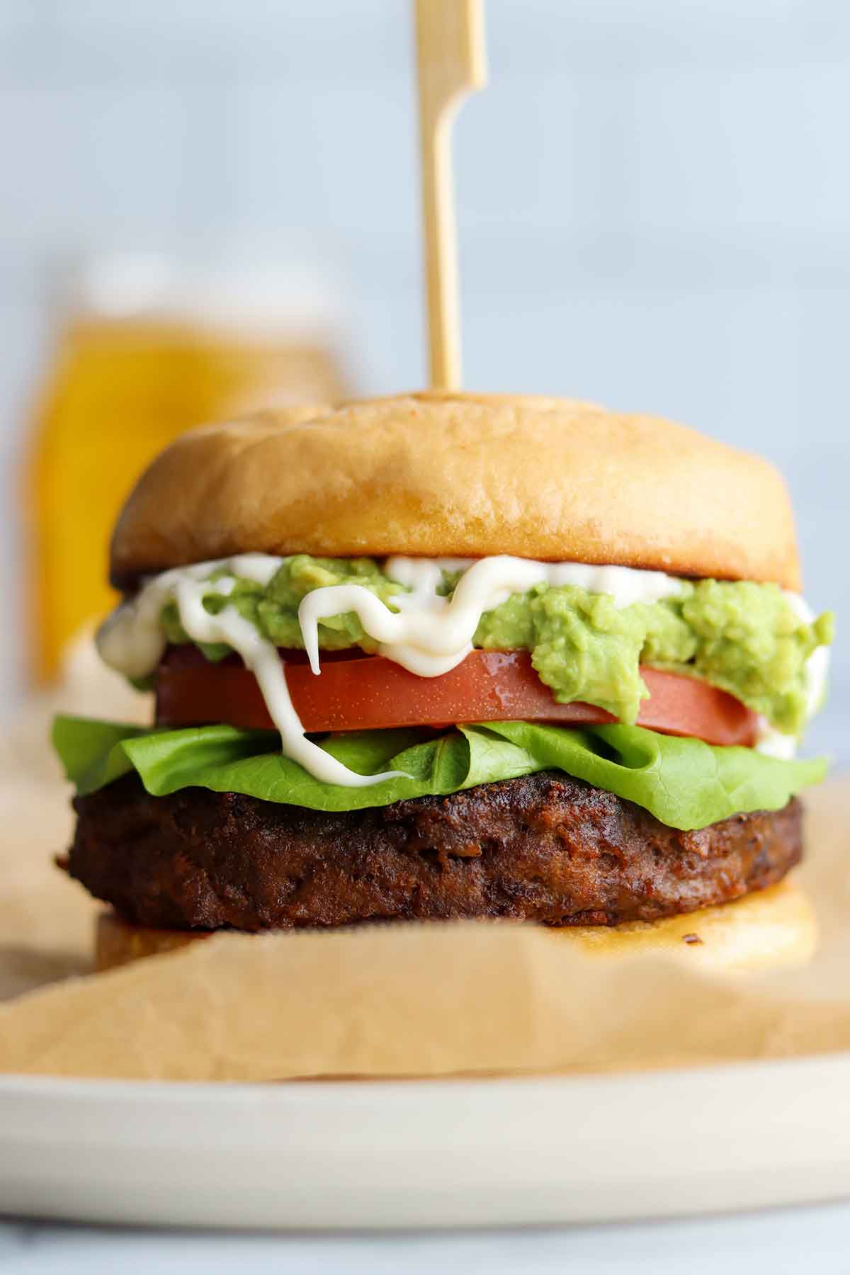 close up view of black bear burger and toppings 