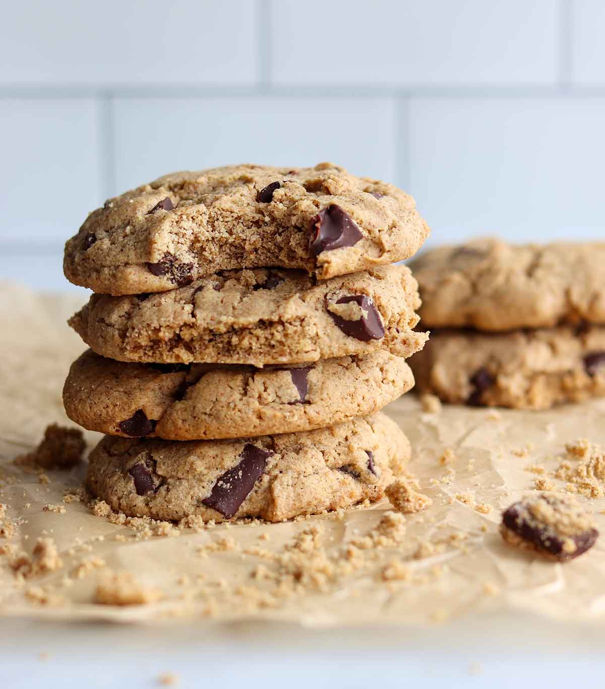 Stacked and partly eaten tigernut flour chocolate chip cookies