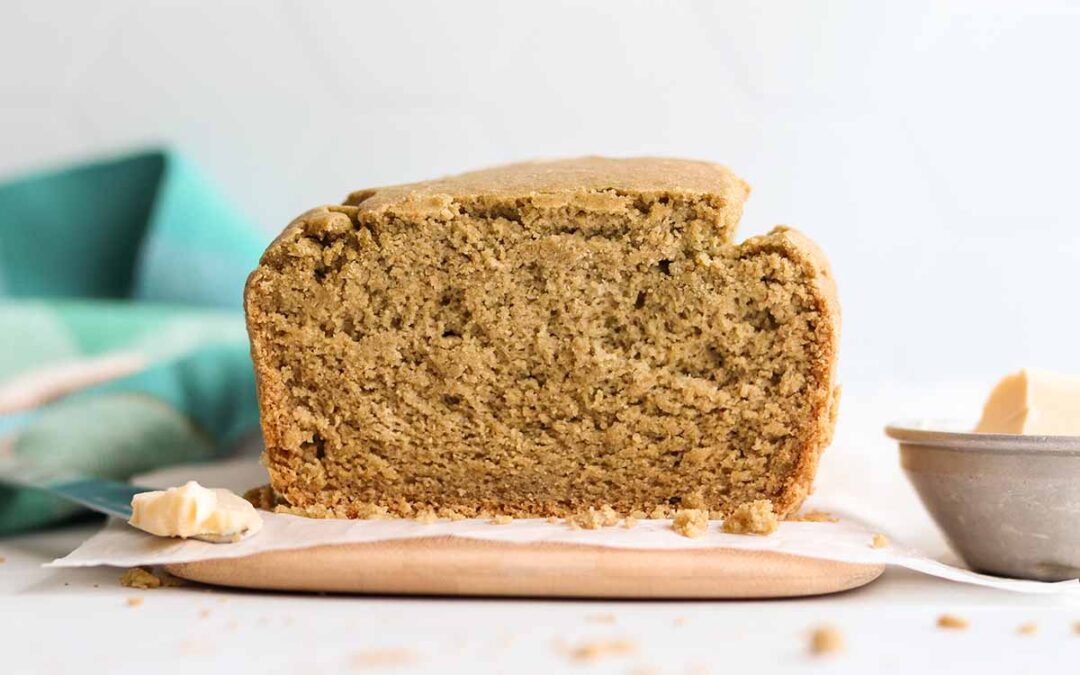 Close up view of sliced oat flour bread